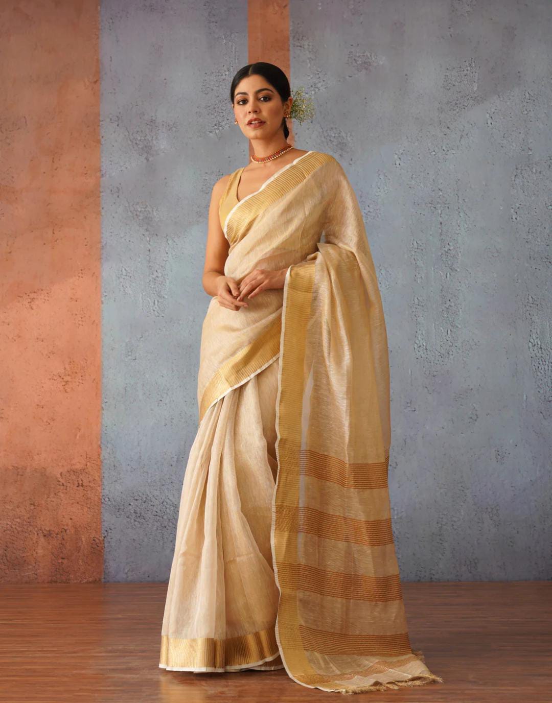 Handwoven Tissue Linen Saree with Golden Zari  Border