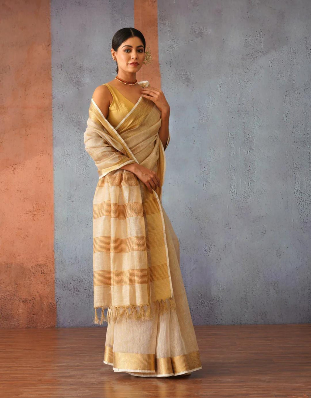 Handwoven Tissue Linen Saree with Golden Zari Border