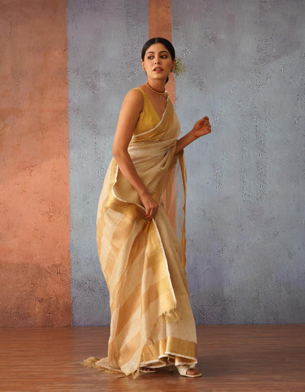 Handwoven Tissue Linen Saree with Golden Zari Border