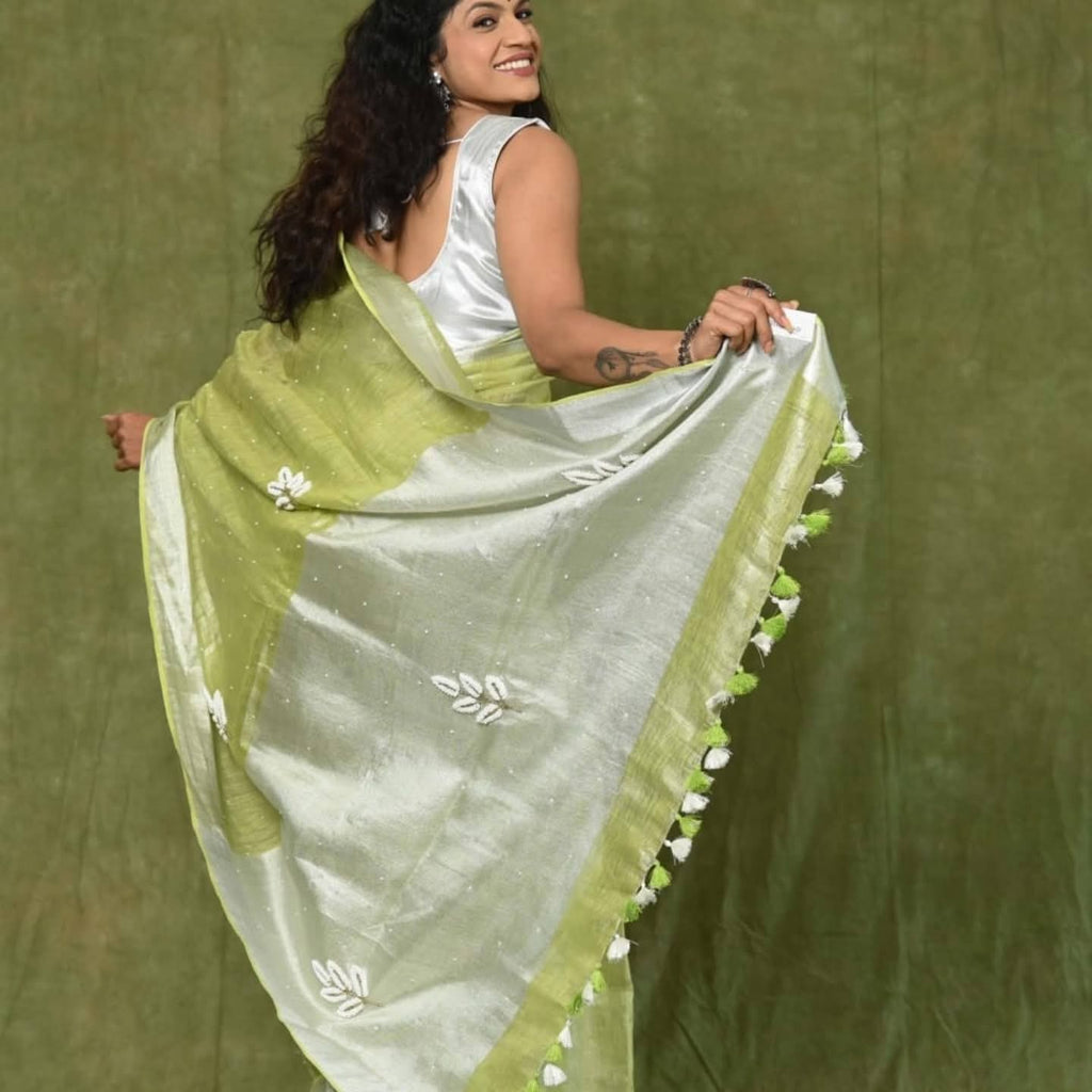 Handwoven Tissue Linen Saree with Silver Zari Border & Handwork Embroidery