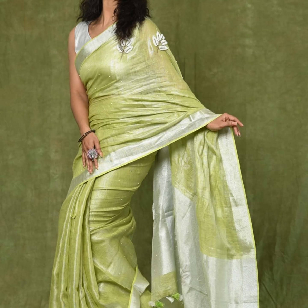 Handwoven Tissue Linen Saree with Silver Zari Border & Handwork Embroidery